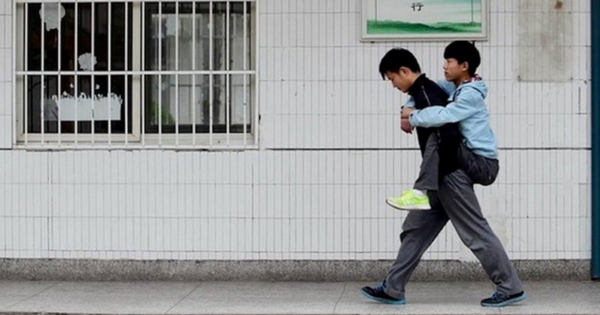 Friend Carries to School Student with MS Top of Class