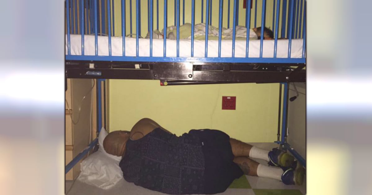 dad asleep under sick son's hospital bed fb