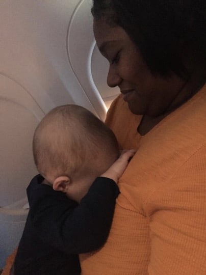 godupdates stranger held an exhausted dad's son on plane 1