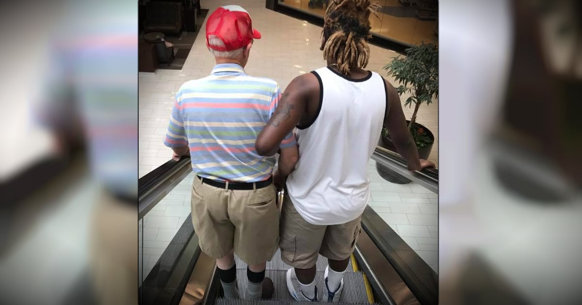 godupdates stranger helps elderly man ride an escalator fb