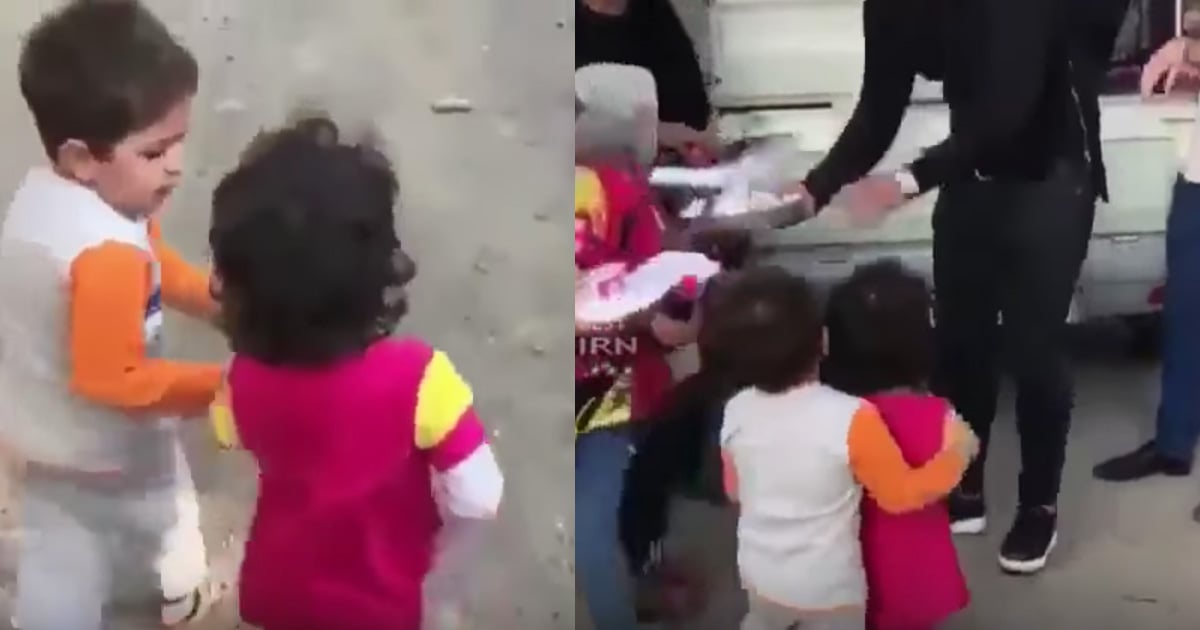 Boy Helps Girl Get Food After Earthquake