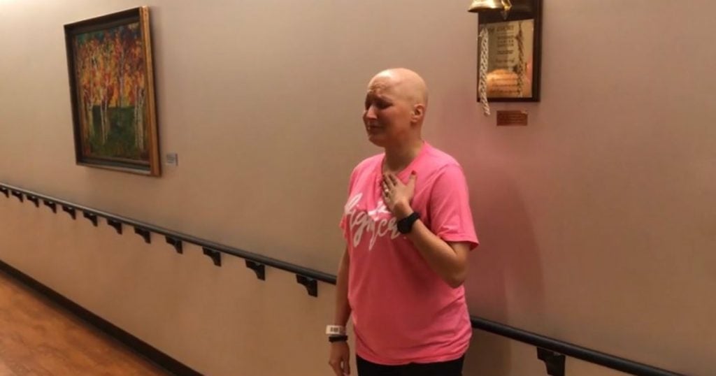 godupdates woman sings after last chemo treatment
