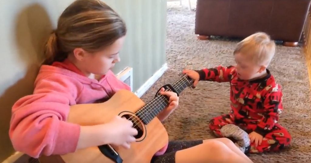 Big Sister Sings 'You Are My Sunshine' To Brother With Down Syndrome