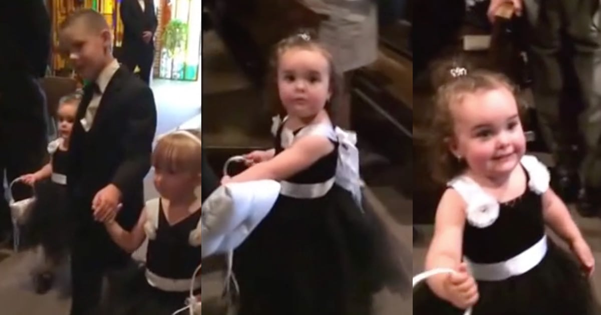 Flower Girl Stops In The Middle Of The Aisle To Say Hi To Dad