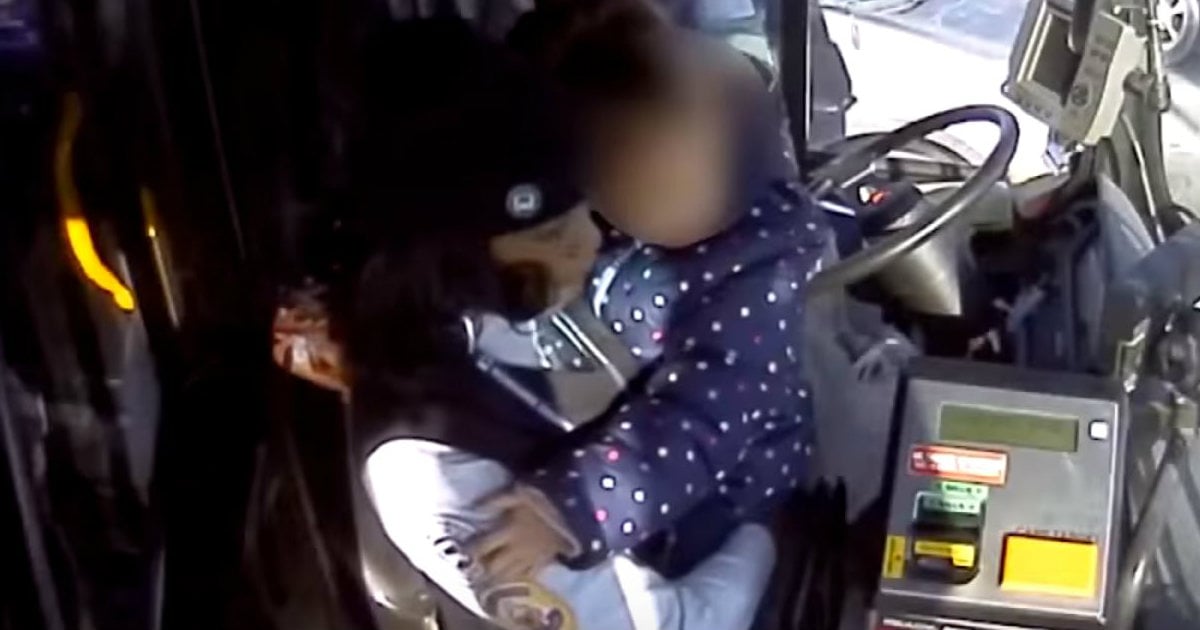 godupdates bus driver comforts crying little girl
