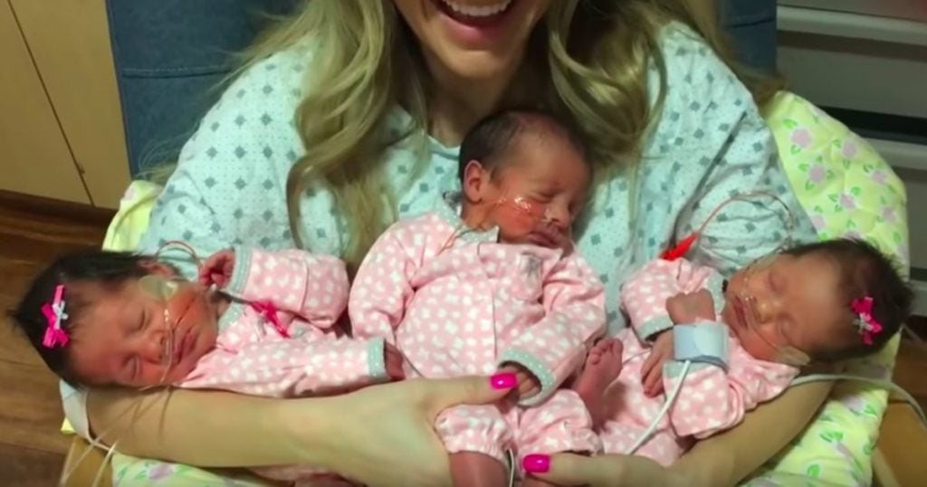 godupdates triplet baby girls cuddle