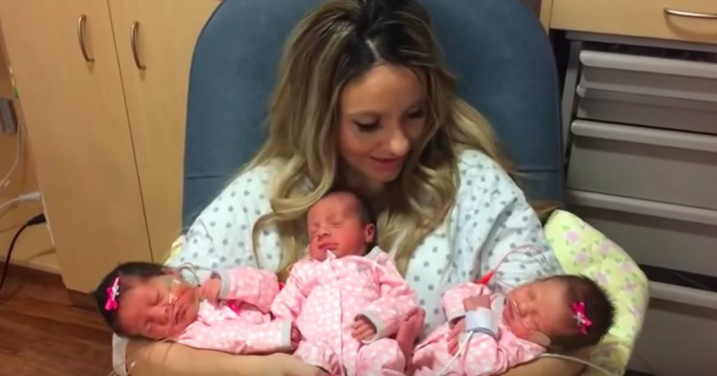 godupdates triplet baby girls cuddle