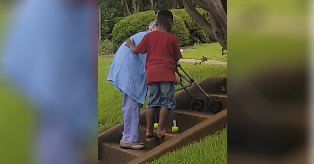 8-Year-Old Helps Elderly Woman Climb Stairs