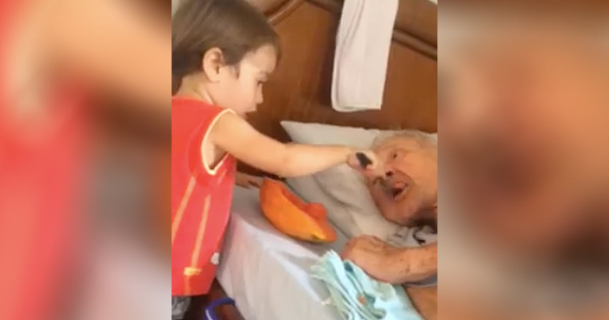 Viral Video of Toddler Feeding His Grandpa
