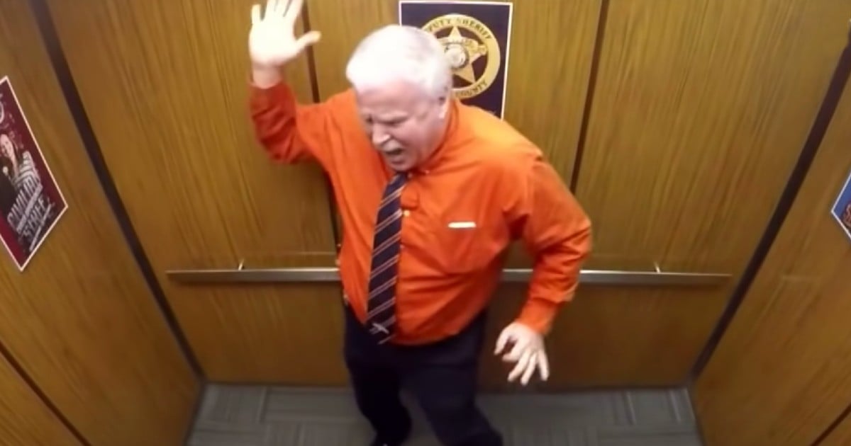deputy dancing in elevator