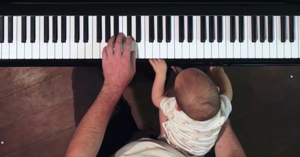 dad and daughter at the piano
