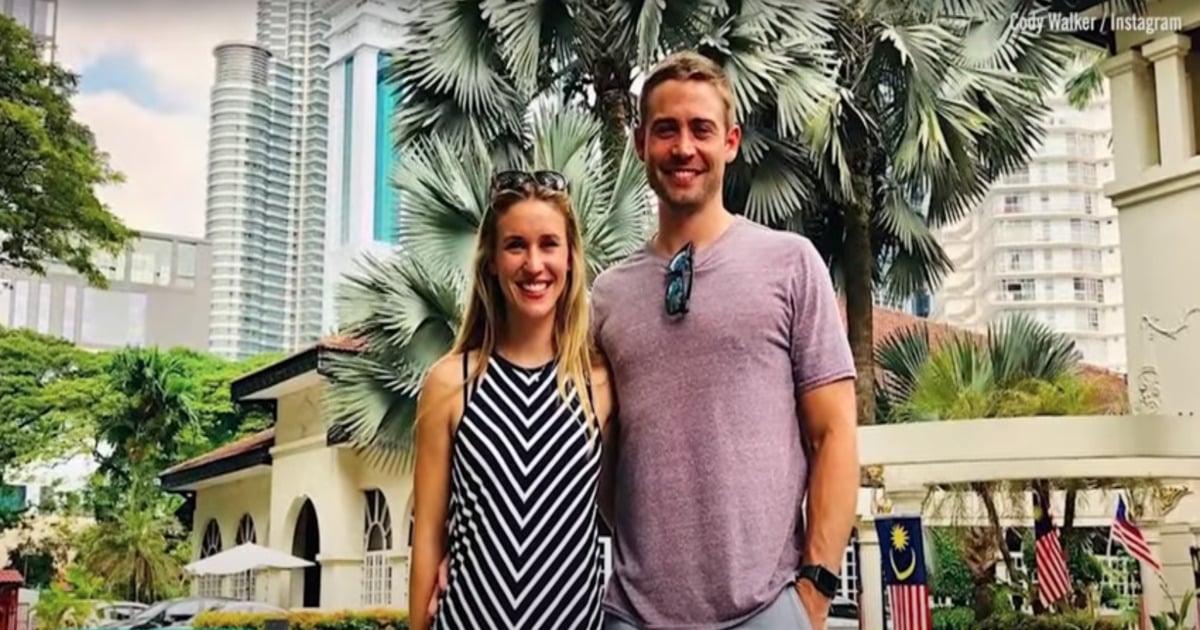 photo of cody walker and his wife